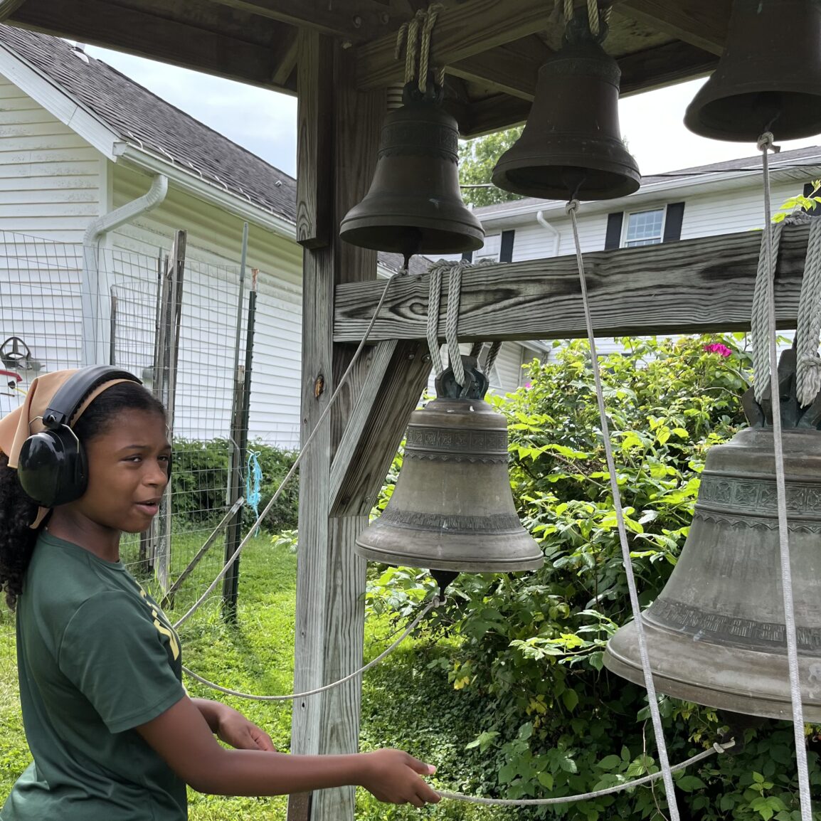 Girl ringing bells